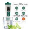 Testeur qualité d'eau 5 en 1 dans un verre, affiche fonctions TDS, pH, EC, salinité et température au Maroc.